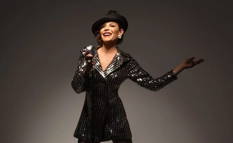 A woman in a stage costume.