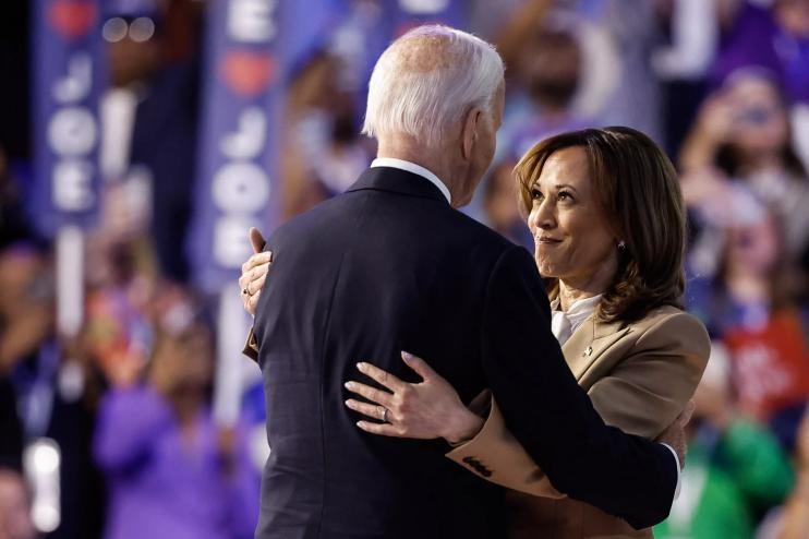 Joe Biden hugs Kamala Harris