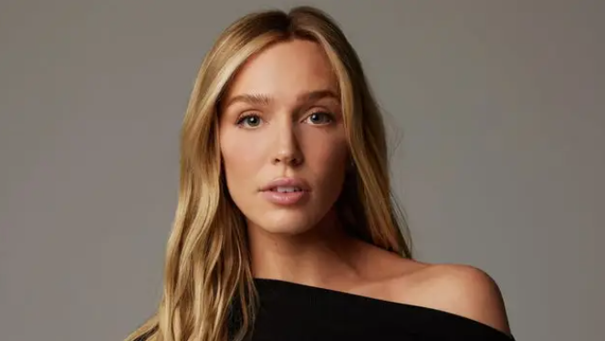 A young blonde woman.