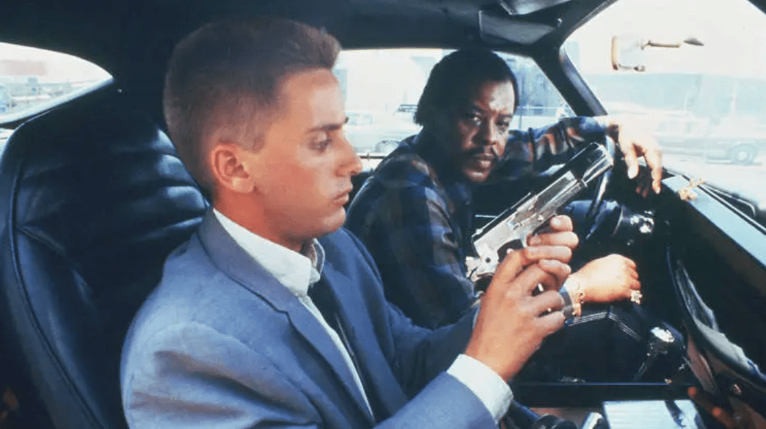 Two men in a car.