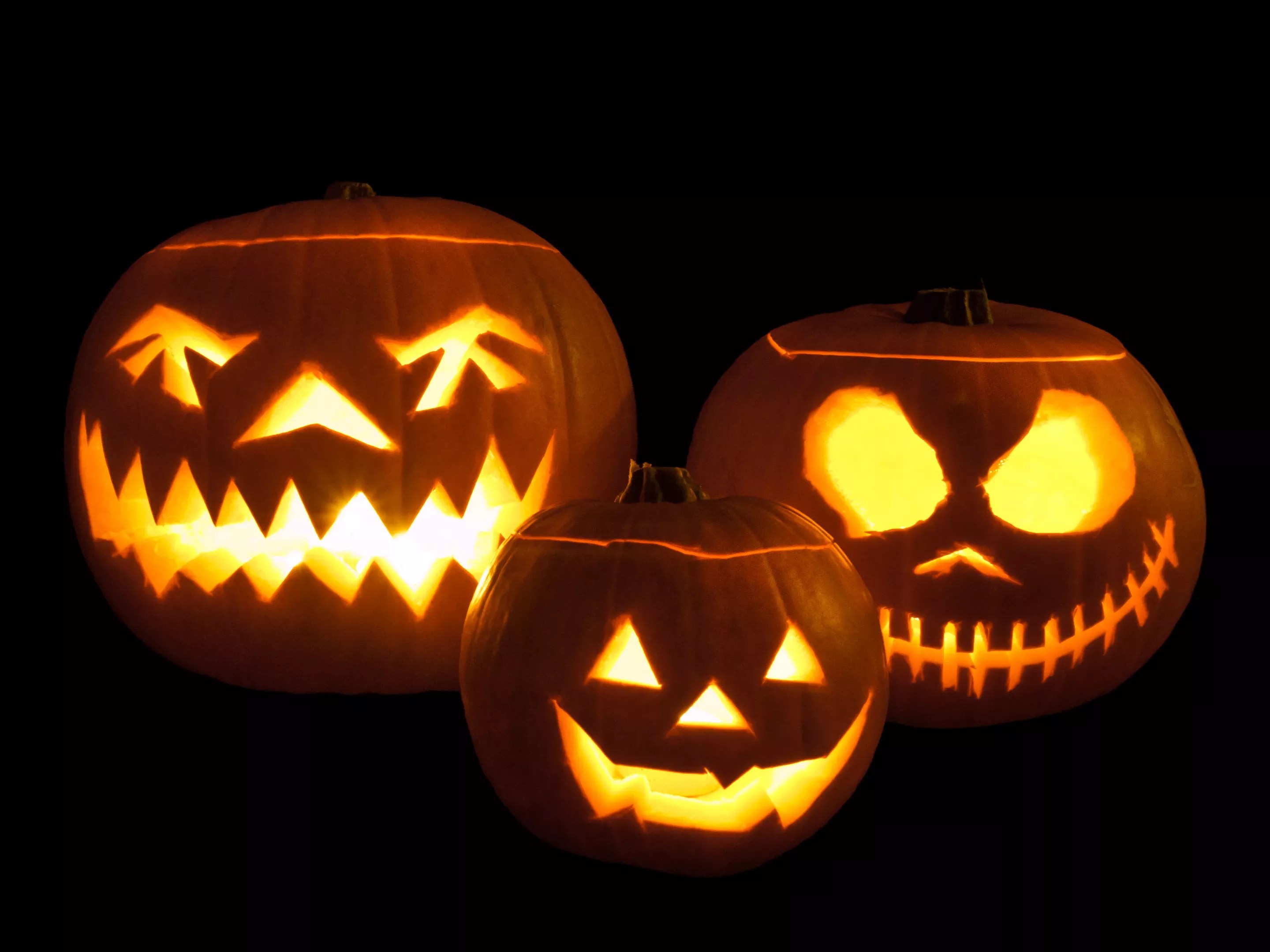 A trio of jack o'lanterns.