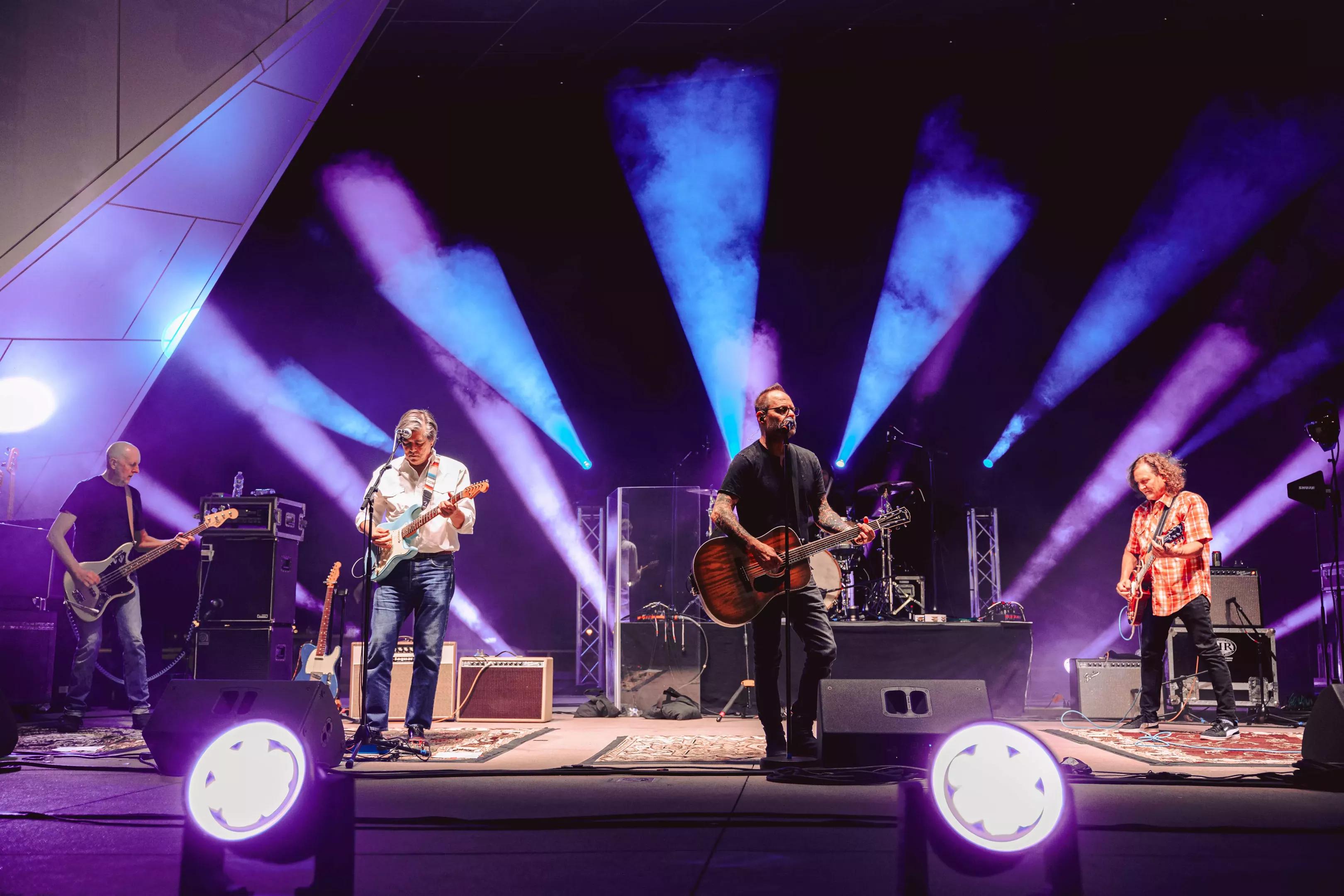 Musicians perform on stage