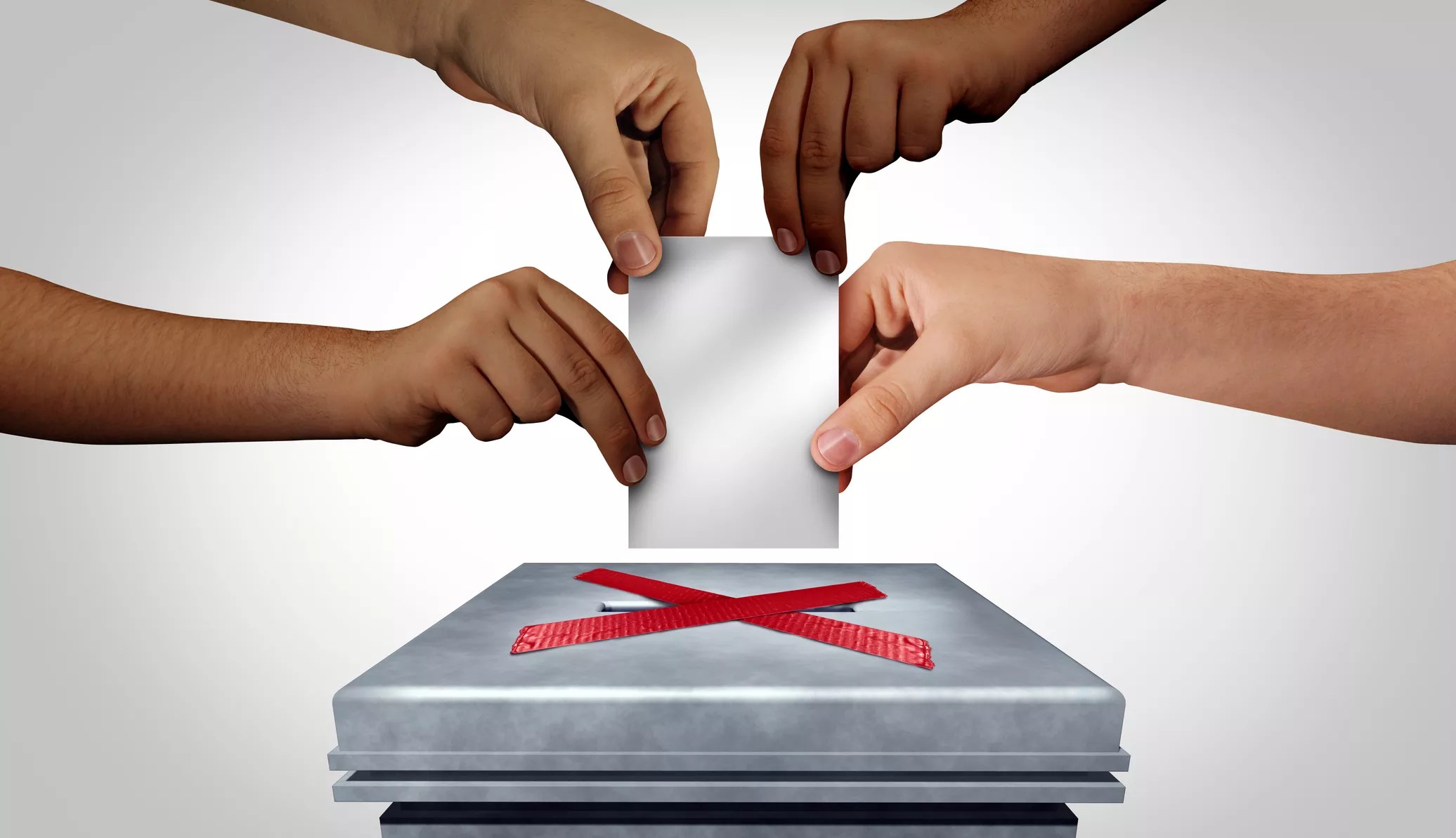 four hands trying to put a piece of paper through a slot that is blocked off with an x