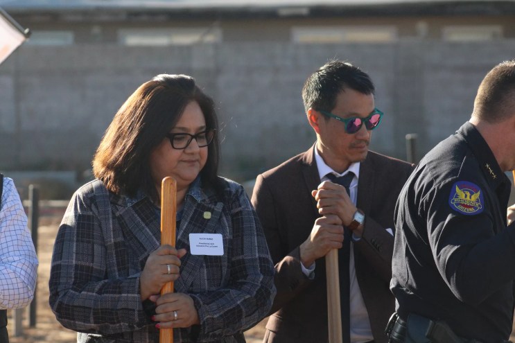 Chicanos Por La Causa President Alicia Nuñez and Vice President of Real Estate Development Nic Smith holding shovels