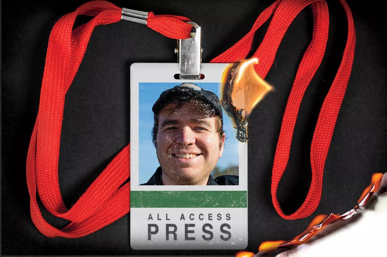 a press badge that's on fire