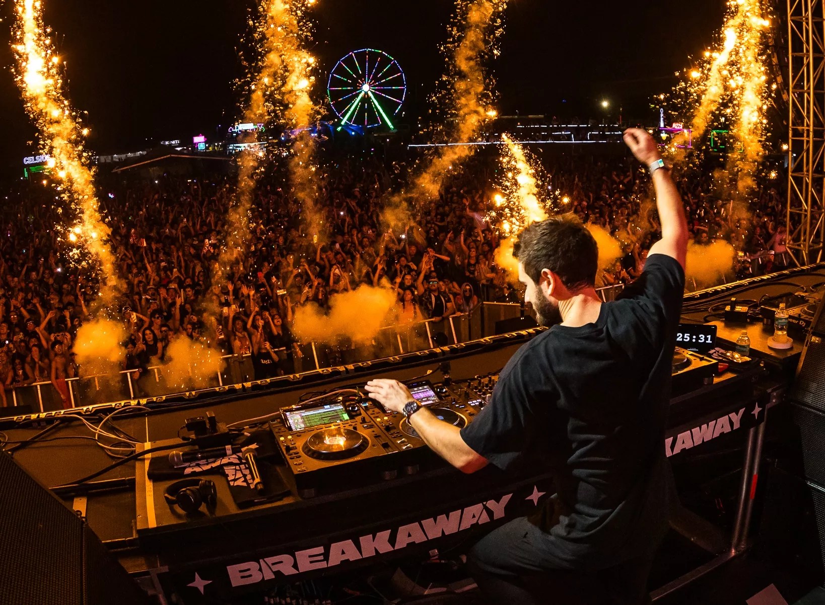 One man performs in front of a crowd