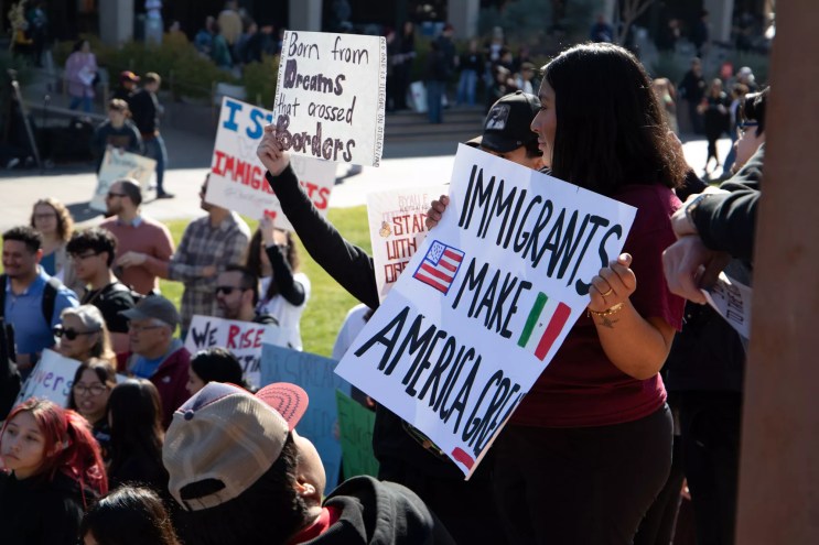 pro-immigrant protest signs