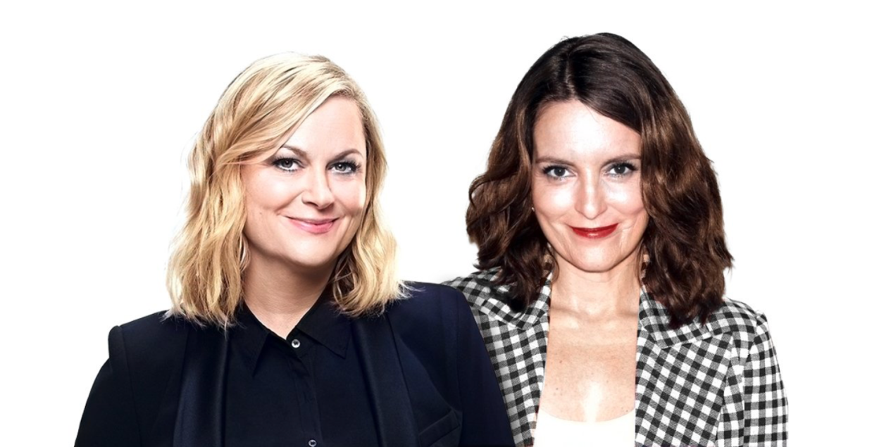 Two white women posing for the camera.