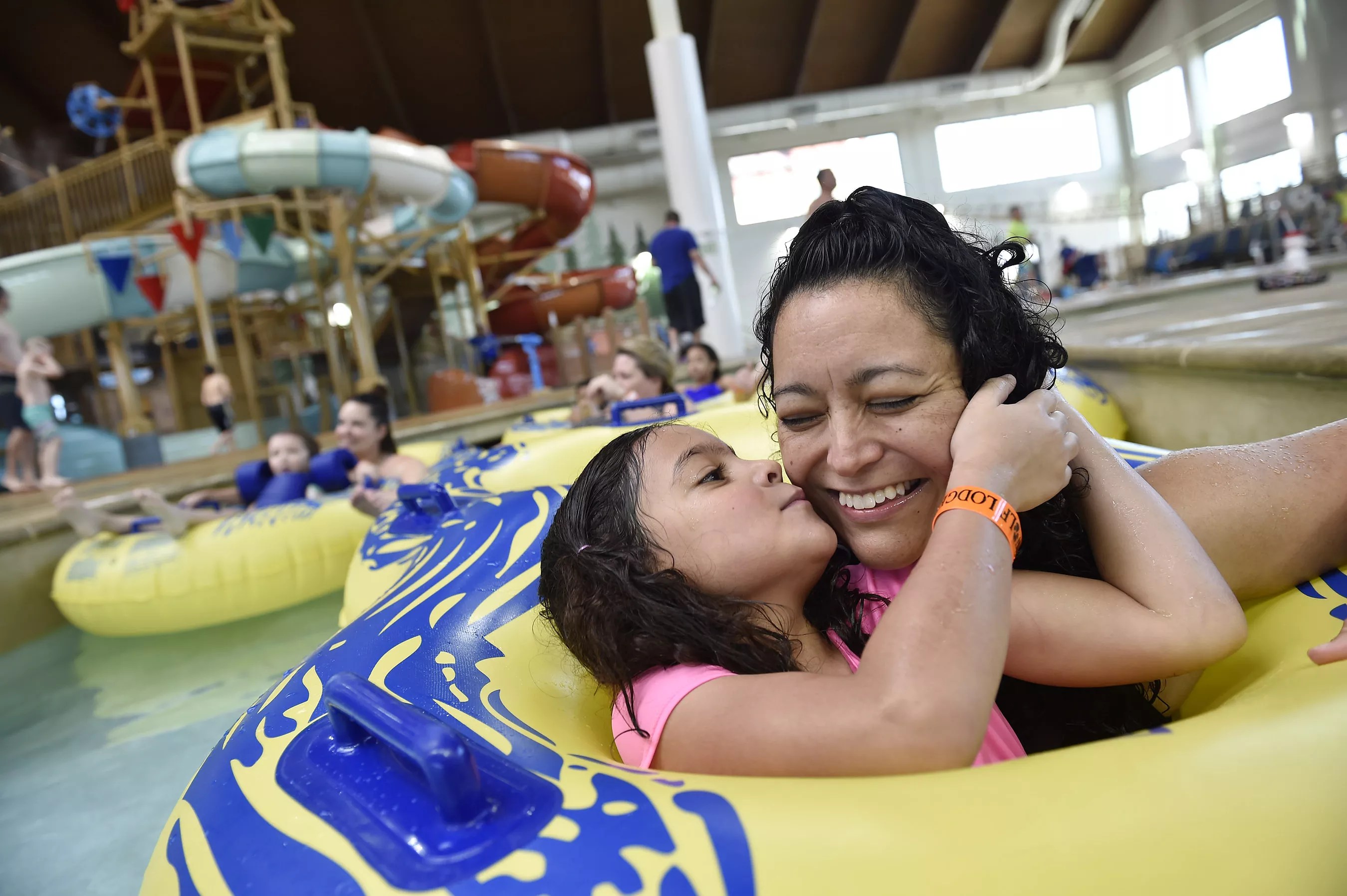 A mother and child at a waterpark.