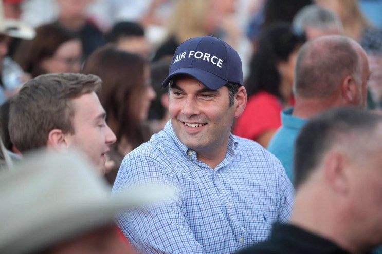 rodney glassman in an "air force" hat