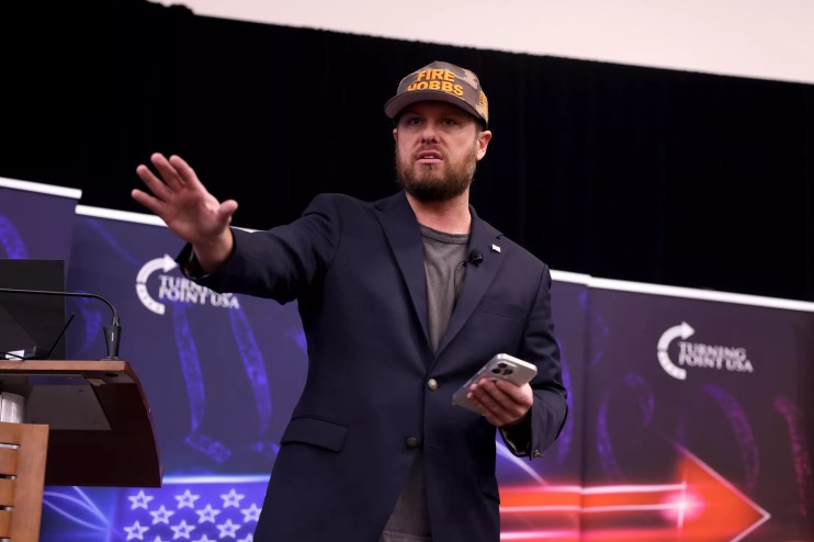 jake hoffman wearing a "fire hobbs" hat