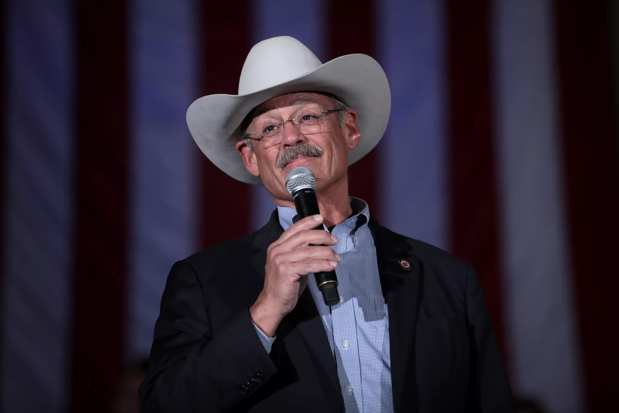 mark finchem in a cowboy hat