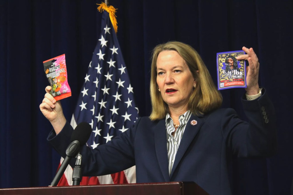 arizona attorney general kris mayes holds up THC-infused products that she said are being illegally sold