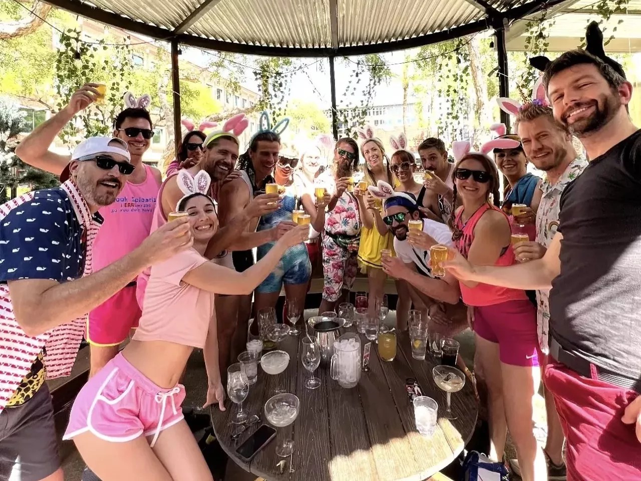 A group of young adults wearing rabbit ears.