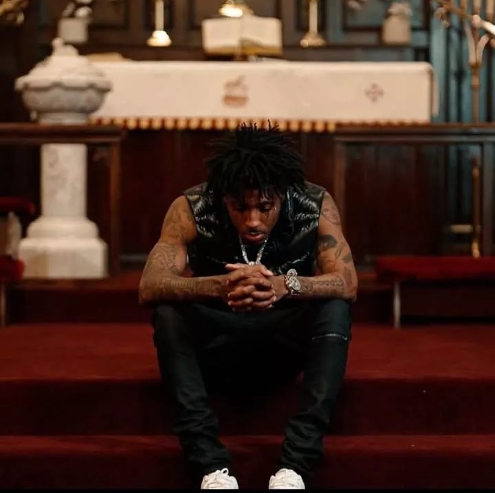 Man sits on stage steps