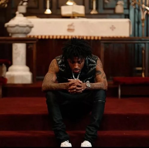 Man sits on stage steps