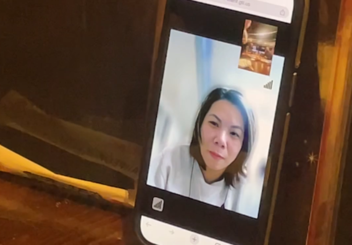 a woman on video chat on a phone