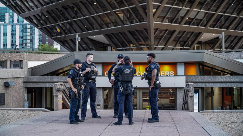 Tempe police congregate outside the Tempe Municipal Building