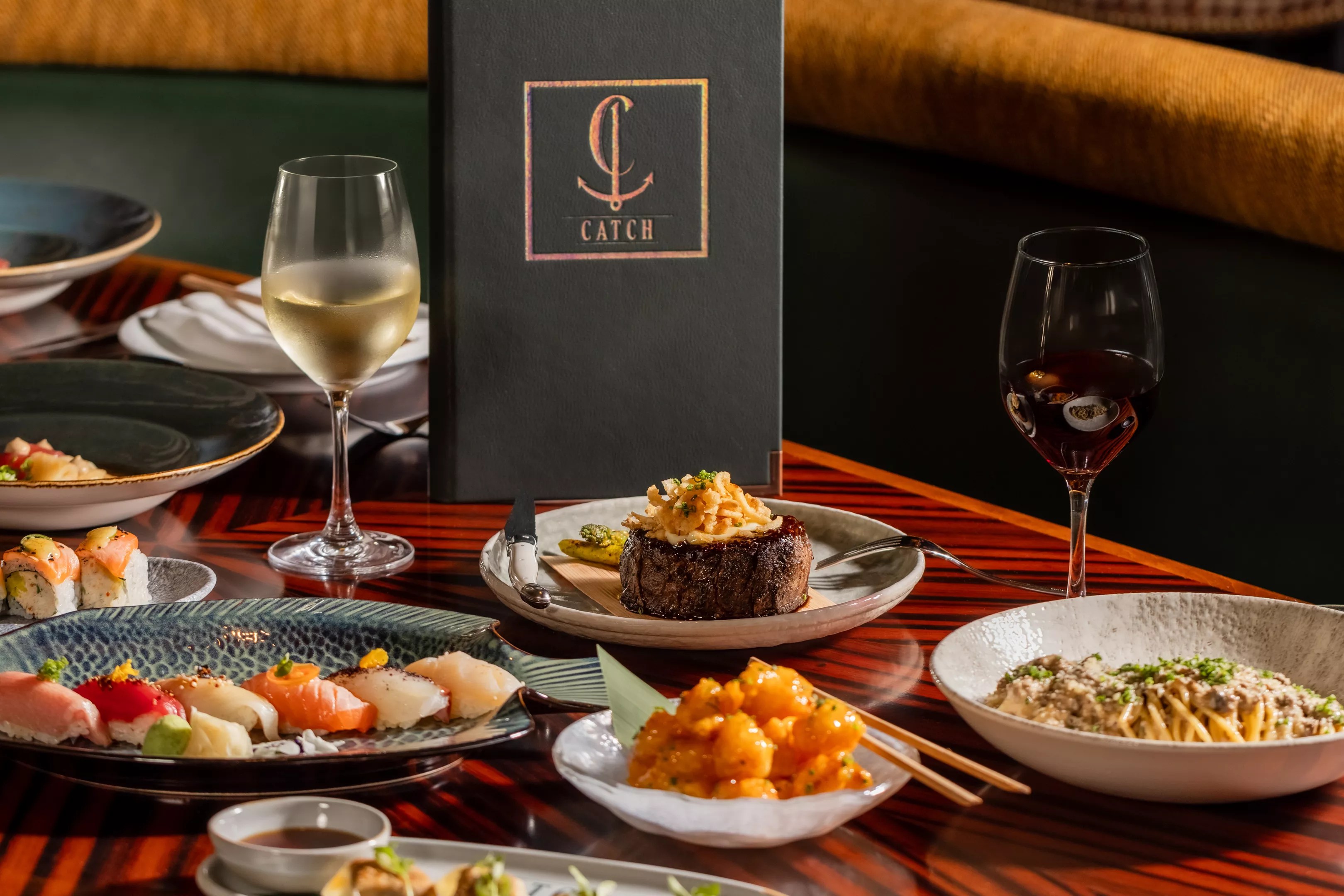 Full table of dishes and drinks from Catch.